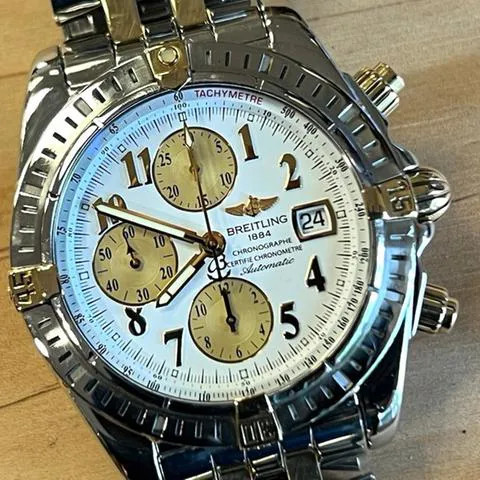 Breitling Chronomat Evolution B13356 43.7mm Yellow gold and stainless steel White