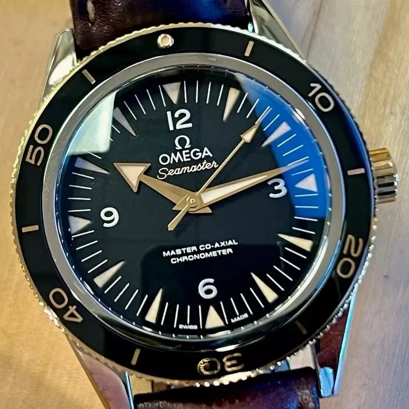 Omega Seamaster 300 233.22.41.21.01.001 41mm Yellow gold Black