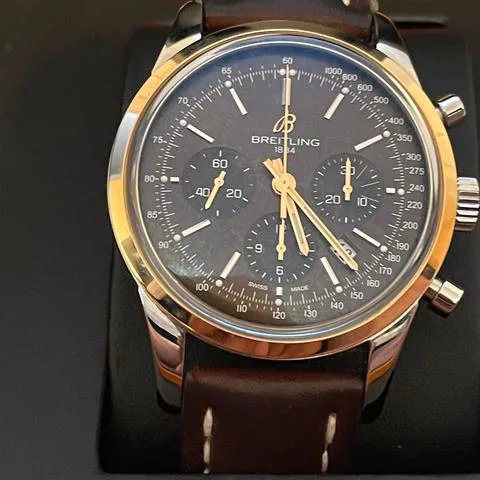Breitling Transocean Chronograph UB0152 43mm Yellow gold and stainless steel Black