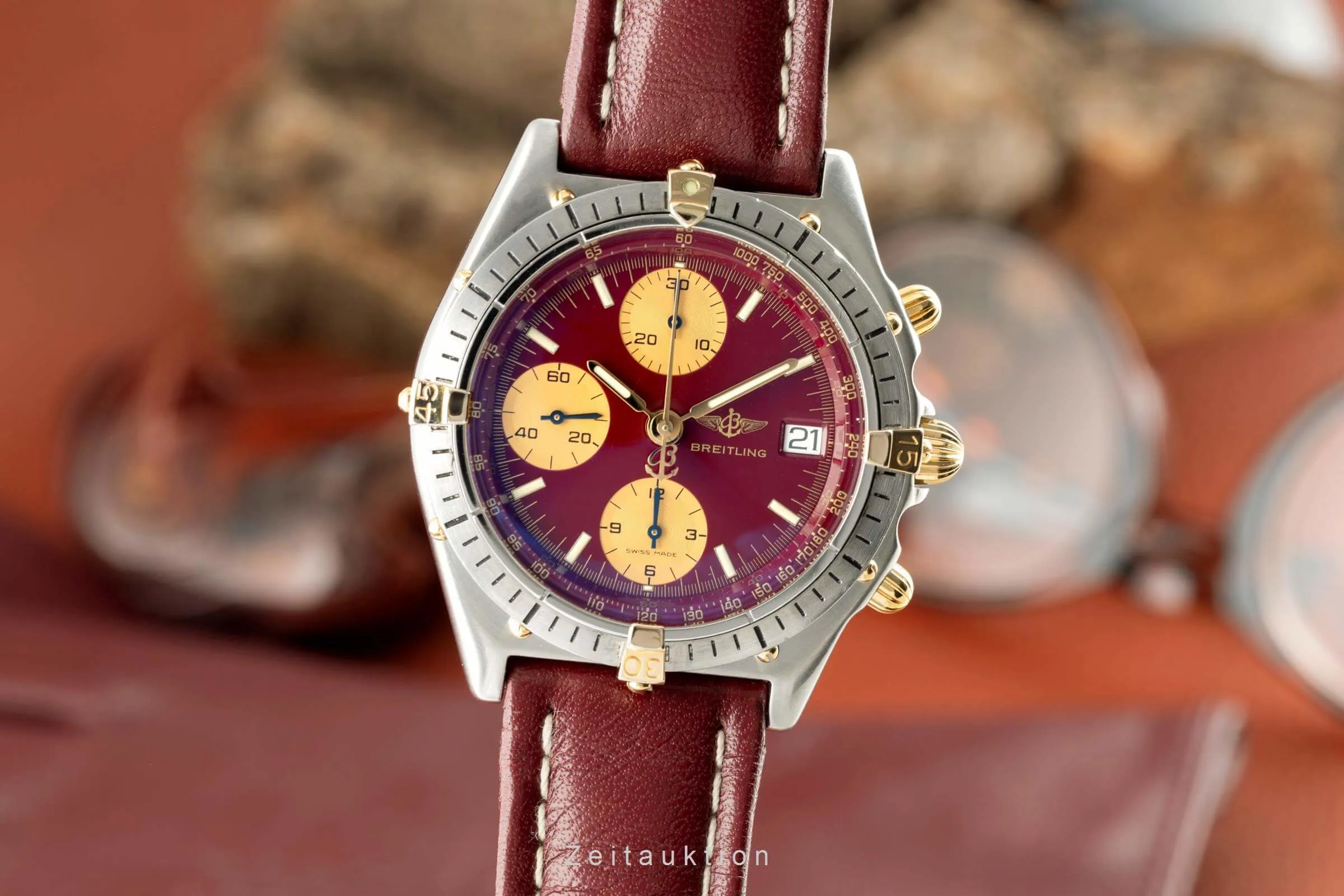 Breitling Chronomat 81950 39mm Yellow gold and stainless steel Red