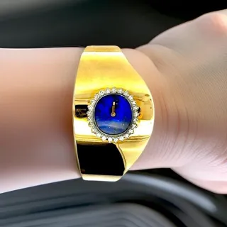 Croton Watch Co. Yellow gold and Diamond Blue