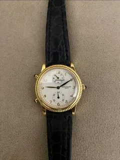 Patek Philippe Travel Time 4864J Yellow gold White