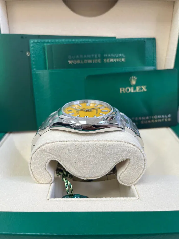 Rolex Oyster Perpetual 41 124300 41mm Oystersteel Yellow 4