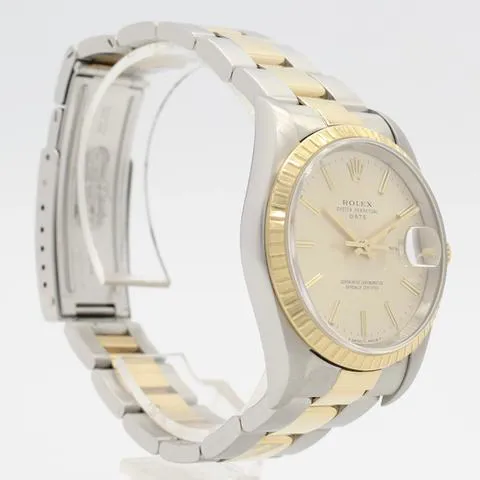 Rolex Oyster Perpetual Date 15223 34mm Yellow gold and stainless steel Champagne 4