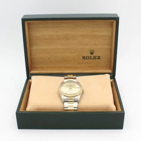 Rolex Oyster Perpetual Date 15223 34mm Yellow gold and stainless steel Champagne 12