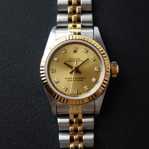 Rolex Oyster Perpetual 67193 26mm Yellow gold and Stainless steel Champagne