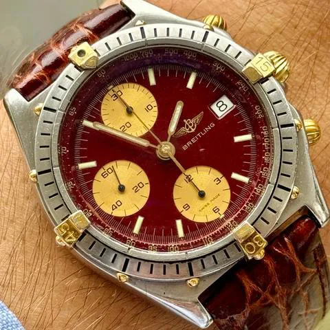 Breitling Chronomat 81950 40mm Yellow gold and stainless steel Bordeaux