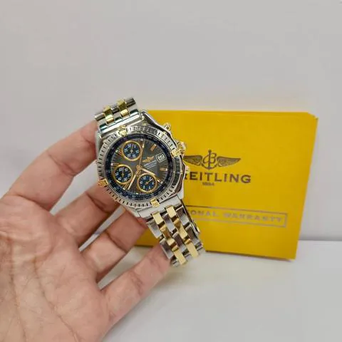 Breitling Chronomat B13050.1 40mm Yellow gold and stainless steel Gray