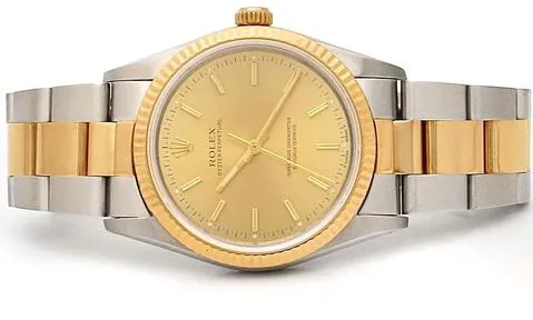 Rolex Oyster Perpetual 34mm Yellow gold and stainless steel Champagne 4