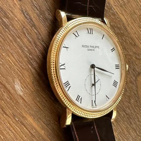 Patek Philippe Calatrava 3919J 33mm Yellow gold White 6