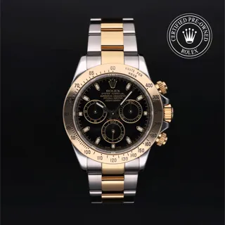 Rolex Daytona 116523 Yellow gold and Oystersteel Black