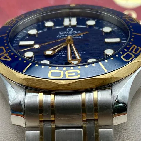 Omega Seamaster Diver 300M 210.20.42.20.03.001 42mm Yellow gold and Stainless steel Blue