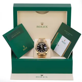 Rolex Day-Date 228238-0004 Yellow gold Black