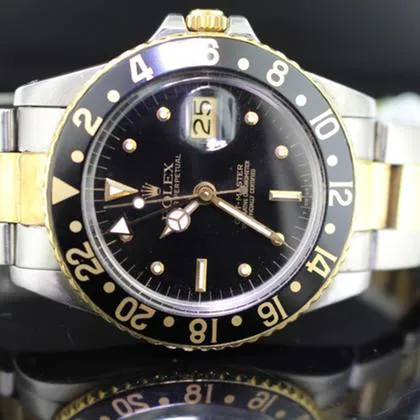 Rolex GMT-Master 16753 40mm Yellow gold and Stainless steel Black