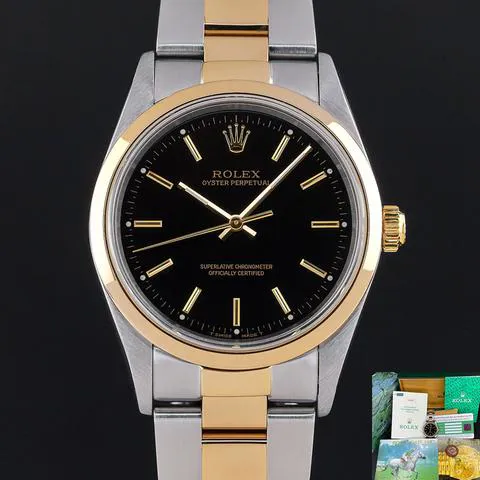 Rolex Oyster Perpetual 34 14203 34mm Yellow gold and stainless steel Black