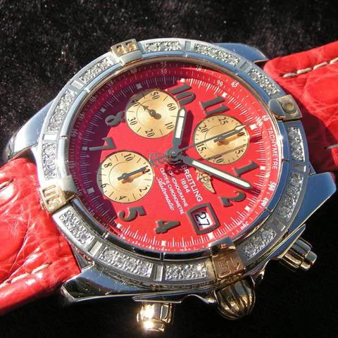 Breitling Chronomat B13356 Yellow gold and stainless steel Red