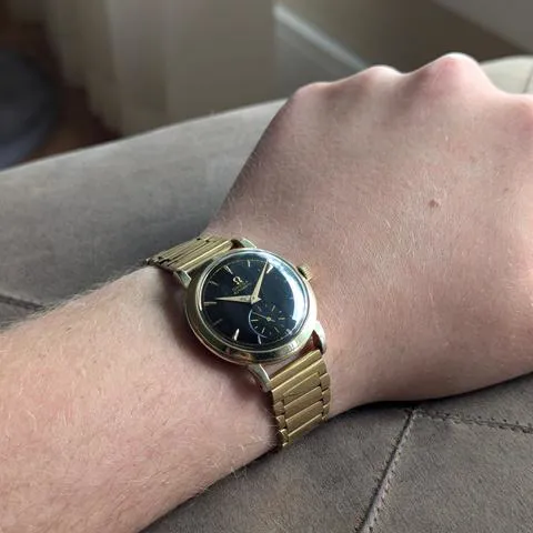 Omega Bumper 34mm Yellow gold