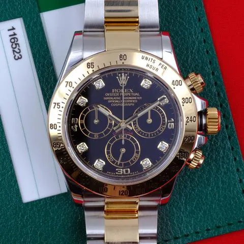 Rolex Daytona 116523 40mm Yellow gold and Stainless steel Black