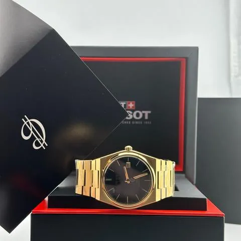 Tissot PRX Powermatic 80 T137.407.33.051.00 Yellow gold Black