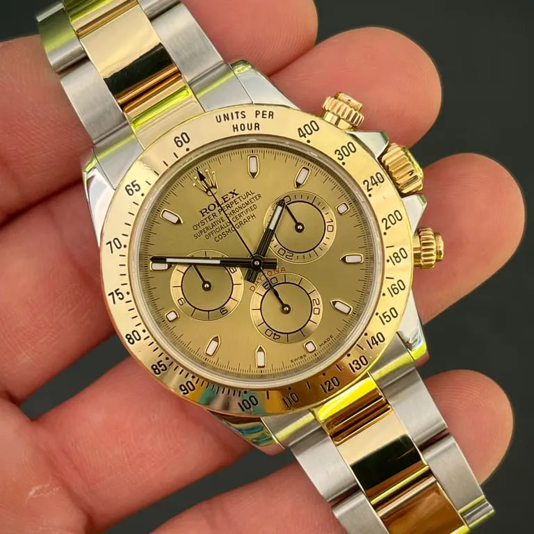 Rolex Daytona 116523-0042 40mm Yellow gold Champagne