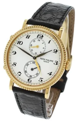 Patek Philippe Calatrava Travel Time 5034J-001 33.5mm Yellow gold White