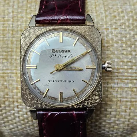 Bulova 28.4mm Yellow gold and stainless steel