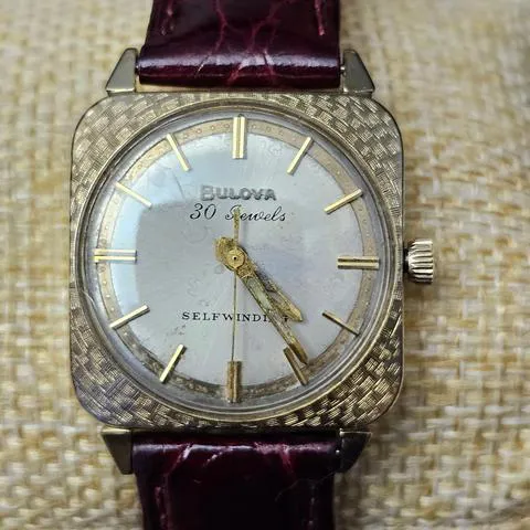 Bulova 28.4mm Yellow gold and Stainless steel 10