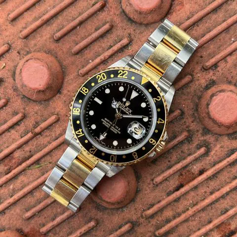 Rolex GMT-Master II 16713 40mm Yellow gold and Stainless steel Black