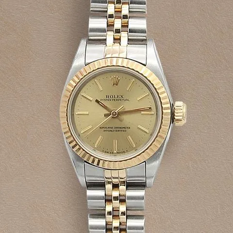 Rolex Oyster Perpetual 67193 26mm Yellow gold and Stainless steel Champagne