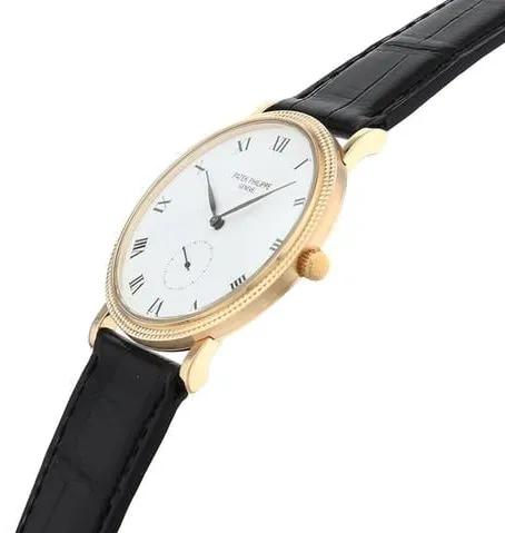 Patek Philippe Calatrava 3919J 33mm Yellow gold White 1