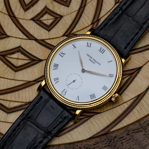 Patek Philippe Calatrava 3919J 33mm Yellow gold White