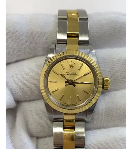 Rolex Oyster Perpetual 67193 26mm Yellow gold and Stainless steel Champagne