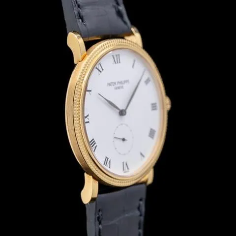 Patek Philippe Calatrava 3919J-001 33mm Yellow gold White 1