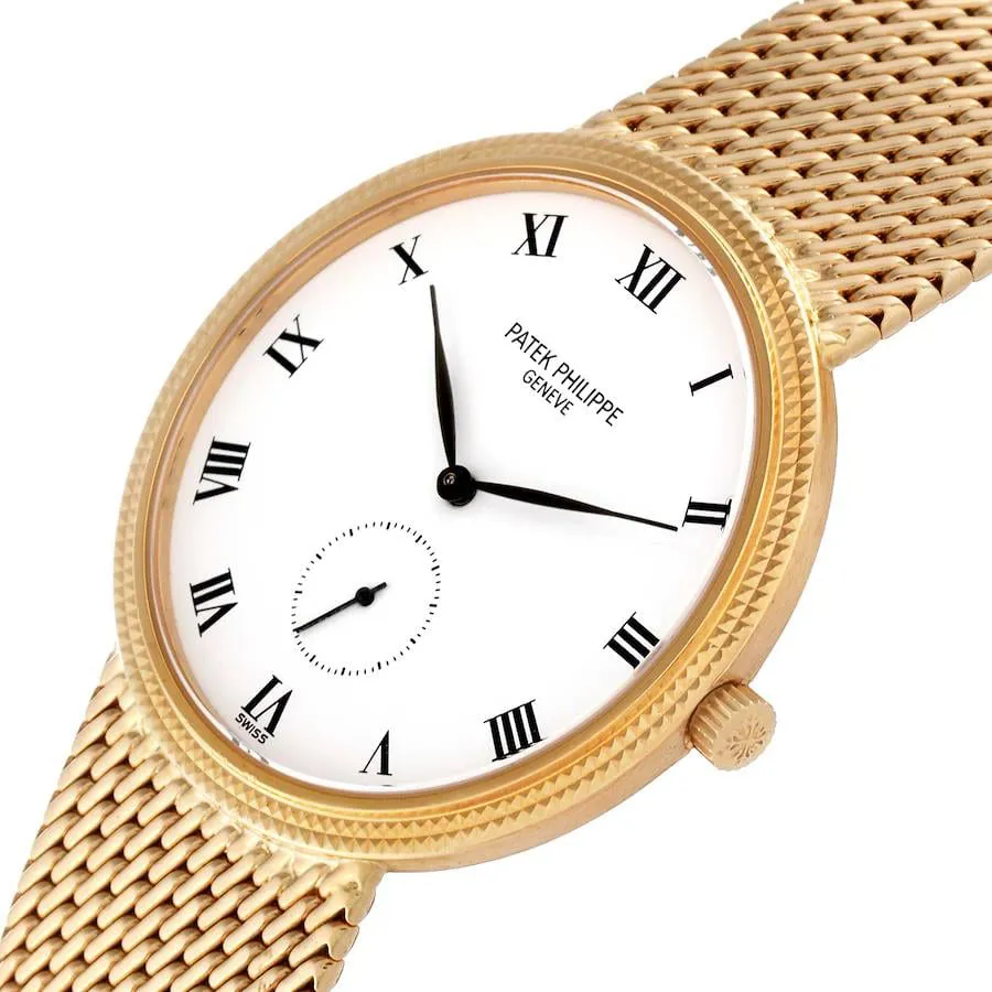 Patek Philippe Calatrava 3919J 33mm Yellow gold White 1