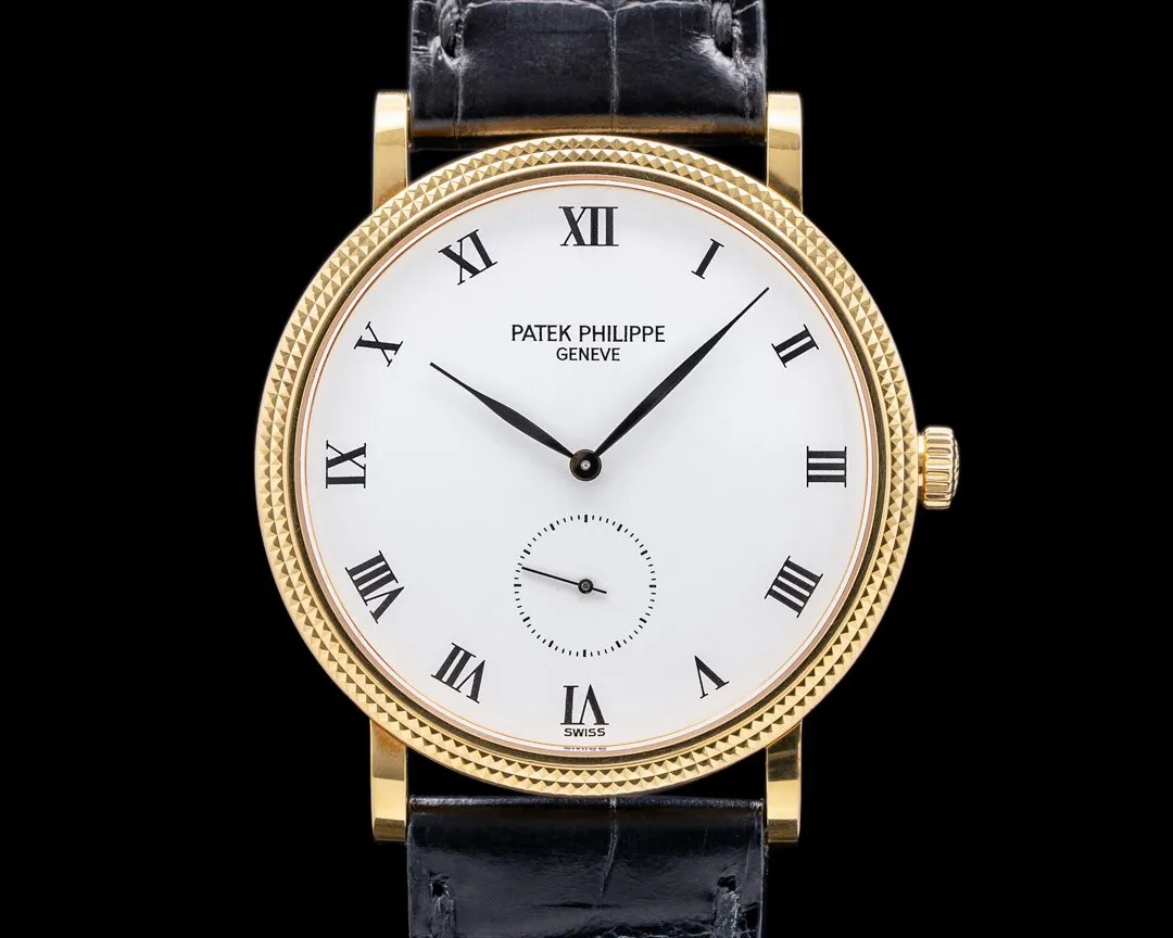 Patek Philippe Calatrava 3919J-001 33mm Yellow gold White