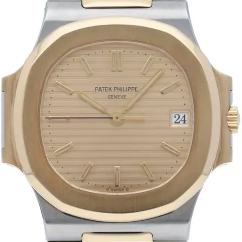 Patek Philippe Nautilus 3800/1JA-001 32mm Yellow gold Champagne