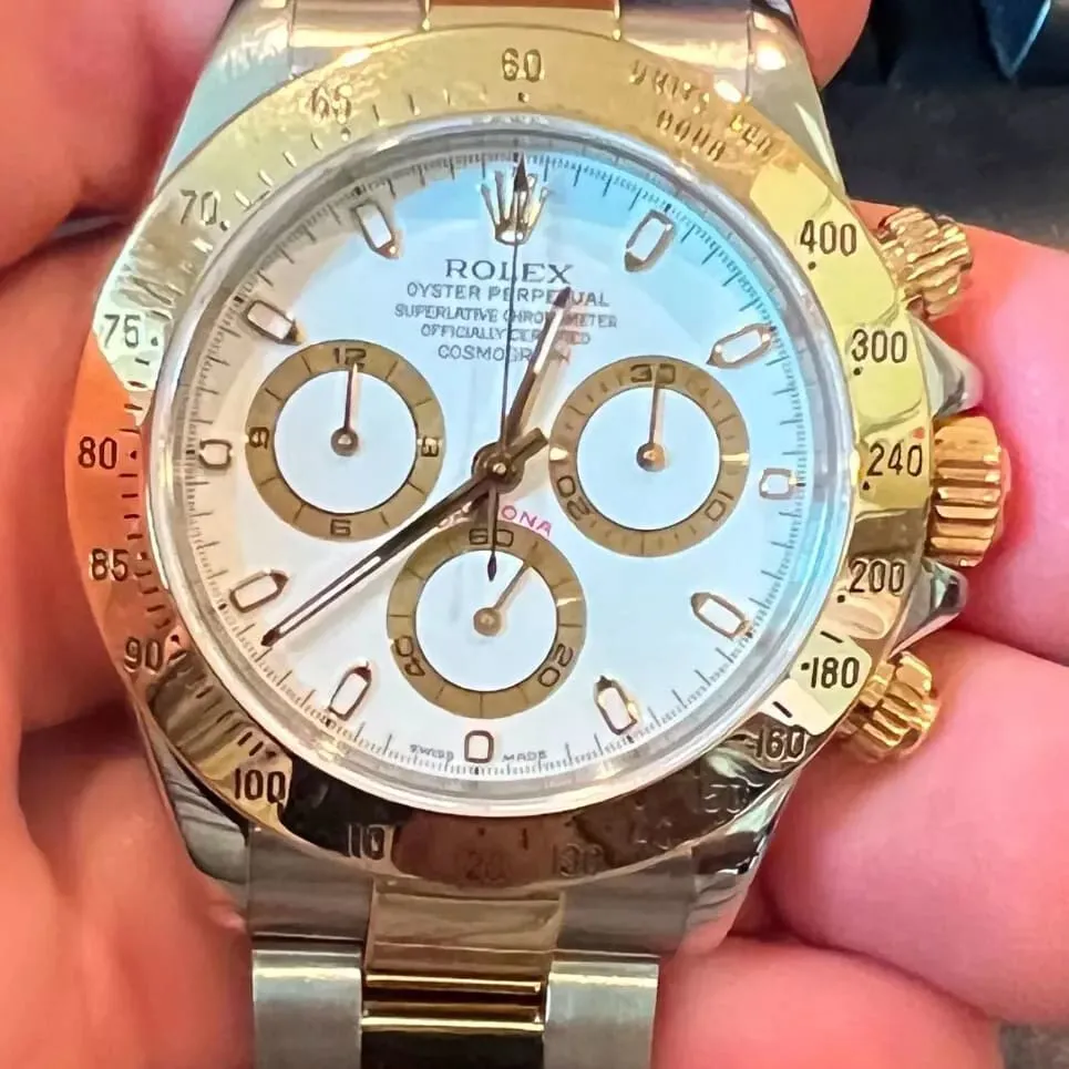 Rolex Daytona 116523-0040 40mm Yellow gold White