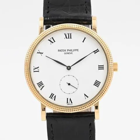 Patek Philippe Calatrava 3919J-001 33mm Yellow gold White