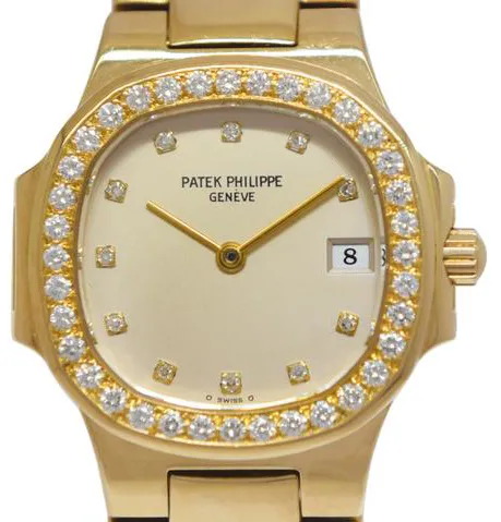 Patek Philippe Nautilus 4700 27mm Yellow gold Champagne