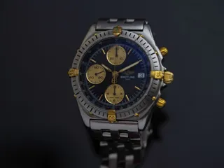 Breitling Chronomat B13048 Yellow gold and Stainless steel Blue