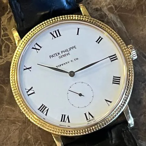 Patek Philippe Calatrava 3919 33mm Yellow gold White