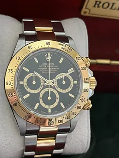 Rolex Daytona 116523 Yellow gold and Stainless steel Noir