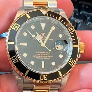 Rolex Submariner 16613 Yellow gold and Stainless steel Black