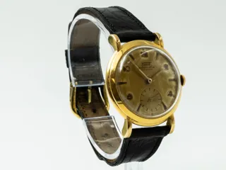 Tissot 18k yellow gold