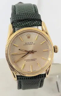 Rolex Oyster Perpetual Chronometer 1011 14k yellow gold Champagne