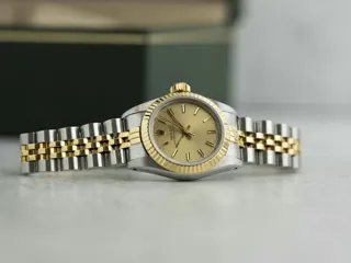 Rolex Oyster Perpetual 67193 Yellow gold and Stainless steel Champagne