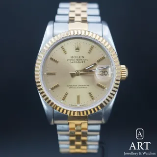 Rolex Datejust 31 68273-001 Yellow gold and Stainless steel Champagne