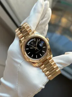 Rolex Day-Date 228238-0067 Yellow gold Black