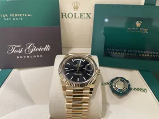 Rolex Day-Date 228238-0007 Yellow gold Black