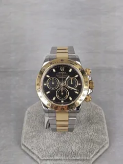 Rolex Daytona 116523-0039 Yellow gold and Stainless steel Black